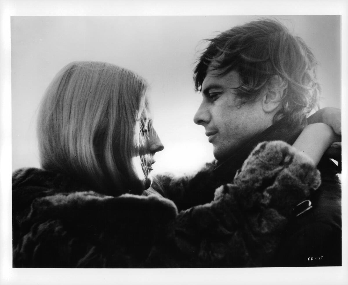 Daniele Ouimet and John Karlen embrace in a scene from the film "Daughters Of Darkness" (1971).
