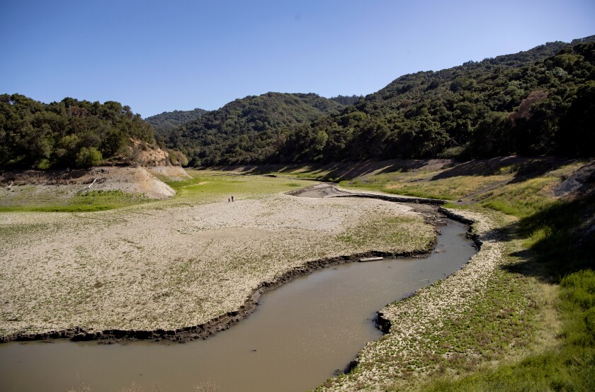 An aerial view shows drought-stricken Stevens Creek Reservoir at 18% capacity in Cupertino.