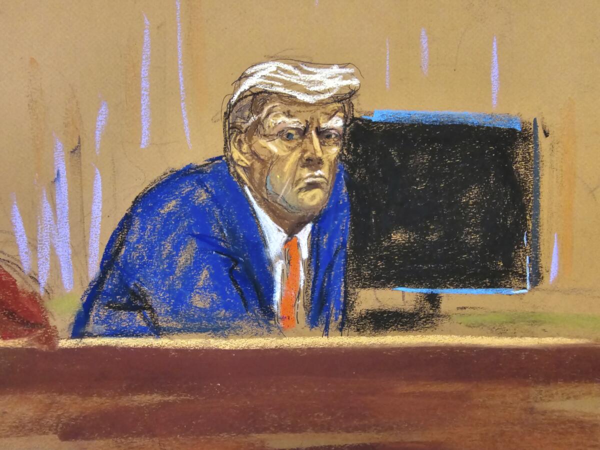 In this courtroom sketch, Trump turns to face the audience at the beginning of his trial.