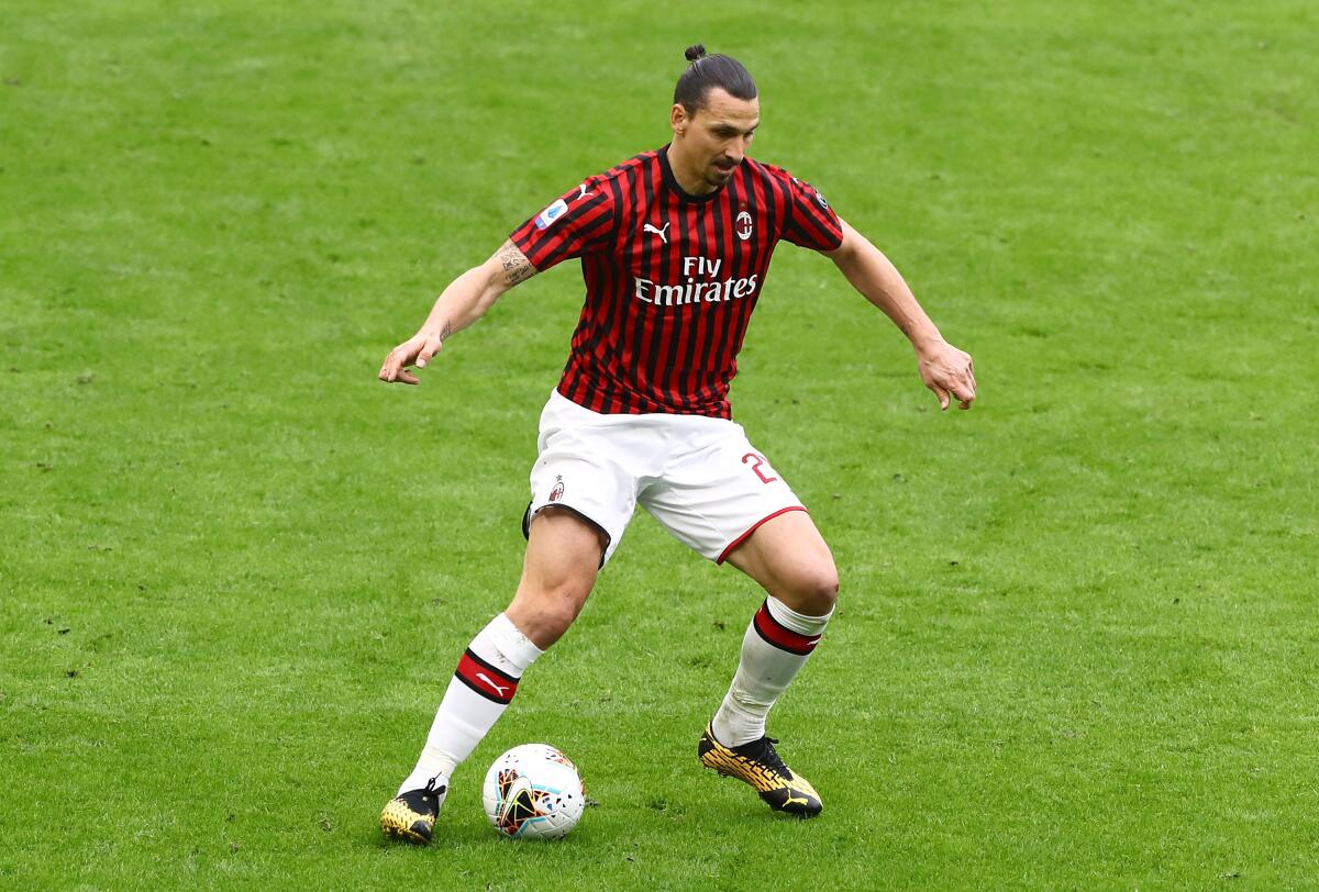 MILAN, ITALY - MARCH 08: Zlatan Ibrahimovic of AC Milan in action during the Serie A match between AC Milan and Genoa CFC  