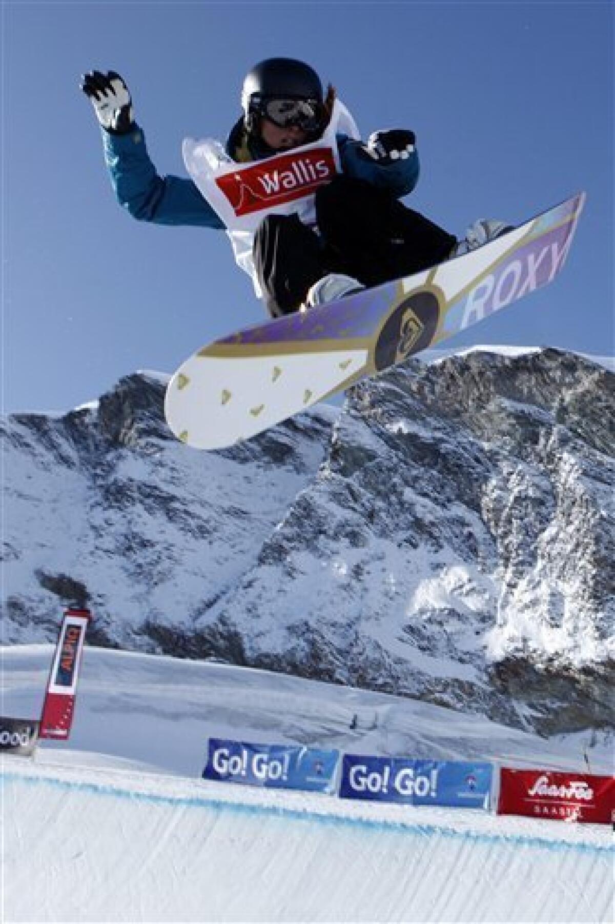 FILE - This is a Nov. 5, 2009, file photo showing Torah Bright of Australia competing during the final of the women's Snowboard Half-Pipe FIS World Cup 2009 event on the Allalin glacier in Saas-Fee, Switzerland. No longer must she fret about her left shoulder staying in place when she should be worrying about landing a switch backside 720. After spring surgery and months of rehab, all her focus can be on preparing for February's Vancouver Olympics, where the 22-year-old Bright will be a gold medal favorite. (AP Photo/Keystone/ Photopress, Jean-Christophe Bott, File)