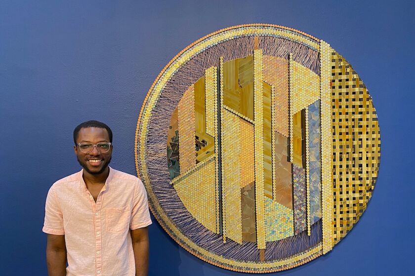 Artist Yaw Owusu with his personal favorite: Same Thing, Different Objects.