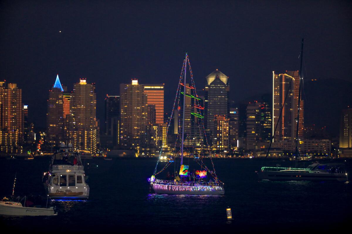 sailboats, yachts and dinghies light up San Diego Bay during the 48th annual San Diego Bay Parade of Lights. 