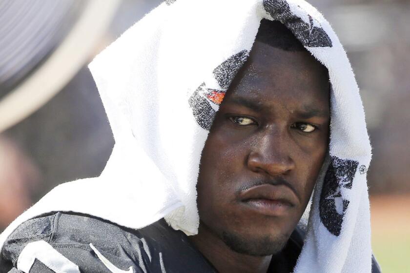 Raiders' Aldon Smith cools off during a game against Baltimore September 2015.