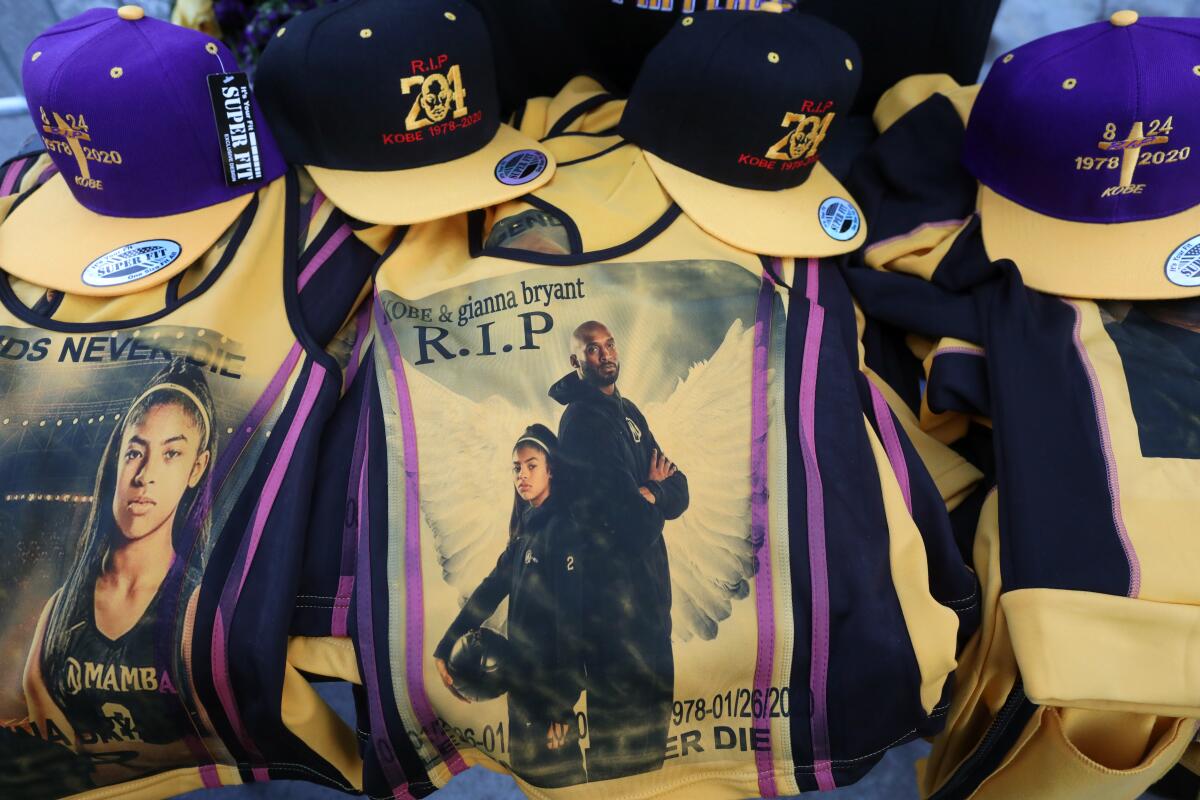 Memorial shirts and hats for Kobe Bryant and his daughter Gianna.