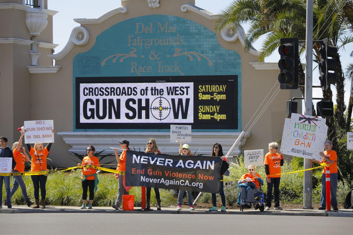 About 80 supporters NeverAgainCa protested outside the Del Mar Fairgrounds against the Crossroads of the West Gun Show where the show was being held.