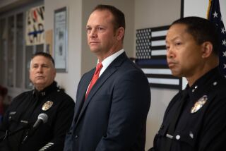 RESEDA, CA - DECEMBER 05: Left to right: Los Angeles Police Capt. Brian Wendling, Detective Joseph Hampton and Deputy Chief Alan Hamilton hold a press conference at the West Valley Division to ask for the public's help about a sexual assault that happened on a hiking trail near Mulholland Drive on November 21. Photographed on Monday, Dec. 5, 2022. (Myung J. Chun / Los Angeles Times)
