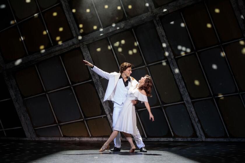 Tony and Stephanie dance in "Saturday Night Fever, the Musical" at Moonlight Amphitheatre.
