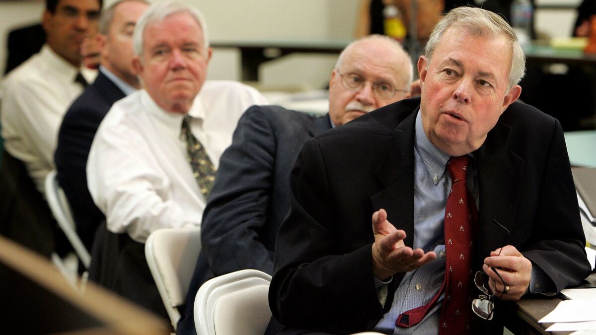 John Van de Kamp, right, leads a 2007 hearing of the California Commission on the Fair Administration of Justice at Loyola Law School.