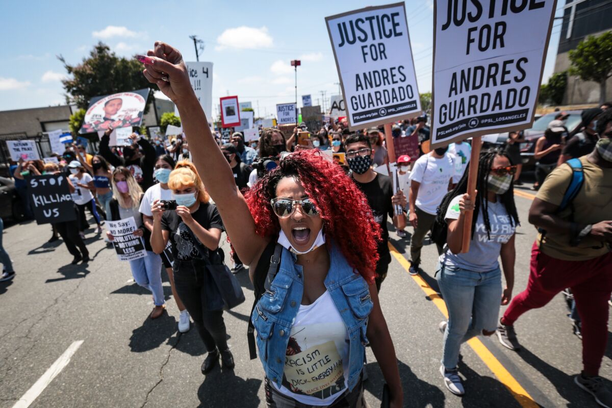 Protesters at a rally  or Andres Guardado, a Gardena man who was fatally shot by a Los Angeles County sheriff's deputy.