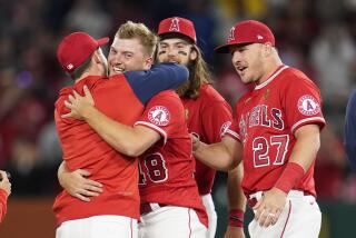 Los Angeles Angels starting pitcher Reid Detmers (48) celebrates with teammates after throwing a no hitter against the Tampa Bay Rays in a baseball game in Anaheim, Calif., Tuesday, May 10, 2022. The Angels won 12-0. (AP Photo/Ashley Landis)