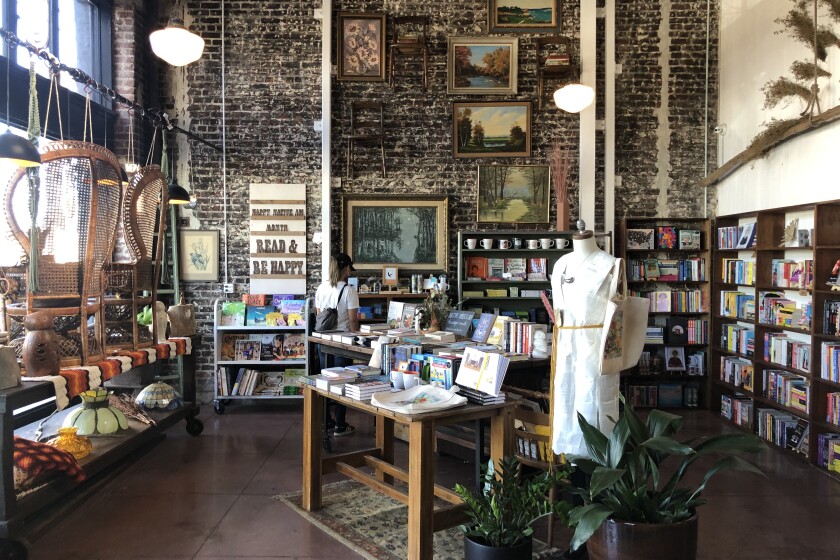 Books, paintings and home accessories on display