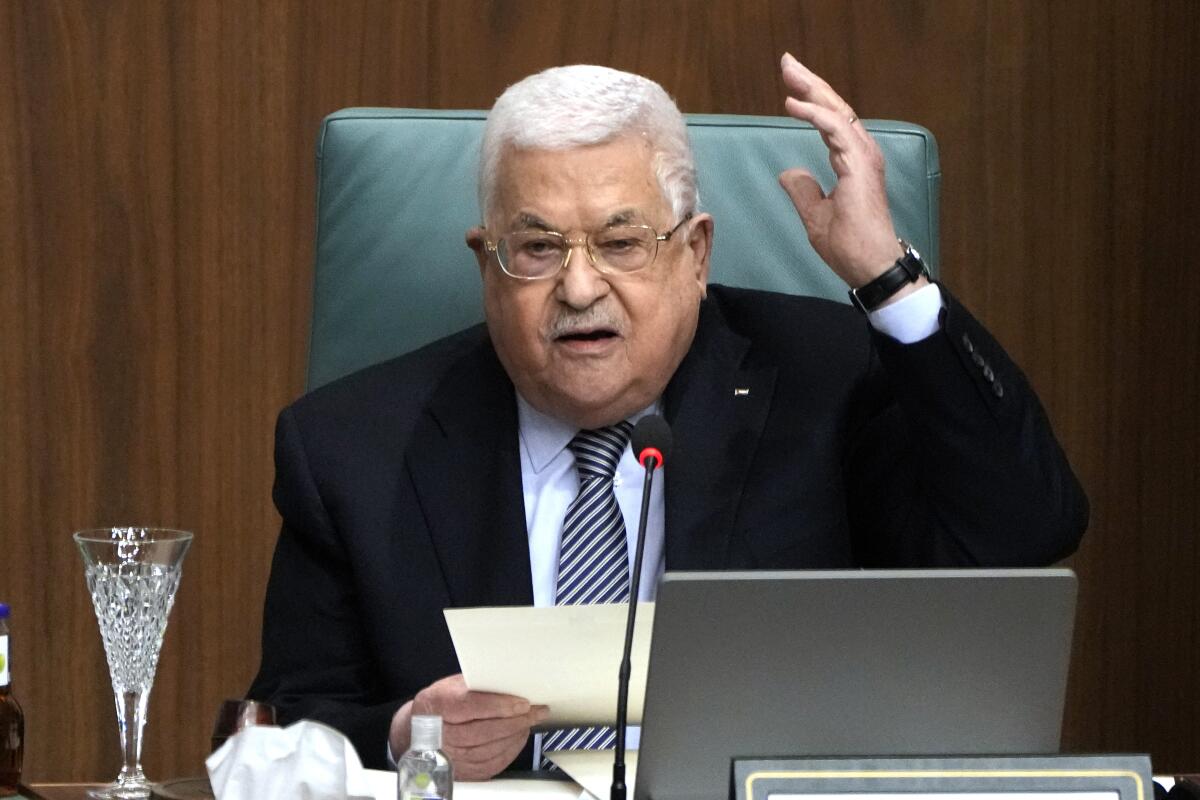 Mahmoud Abbas speaks at a conference.