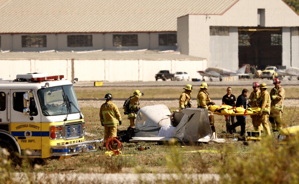 Ventura County Firefighters extricate one of 2 fatal victims of a single engine aircraft that crashed approx 1:30pm at Camarillo Airport. FAA & NTSB are onscene to conduct an investigation.