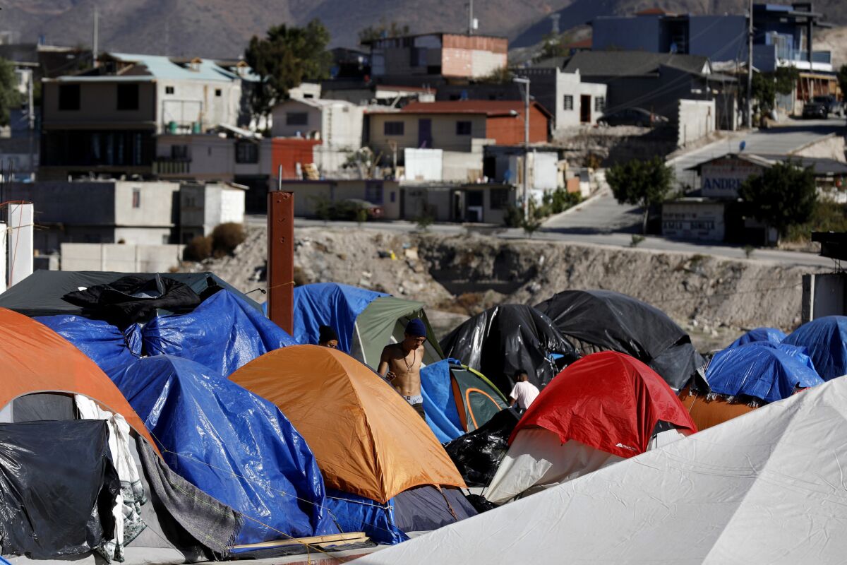 Members of the migrant caravan have set up camp at El Barretal, an abandoned concert venue turned government shelter 30 minutes from the U.S. border in Tijuana.