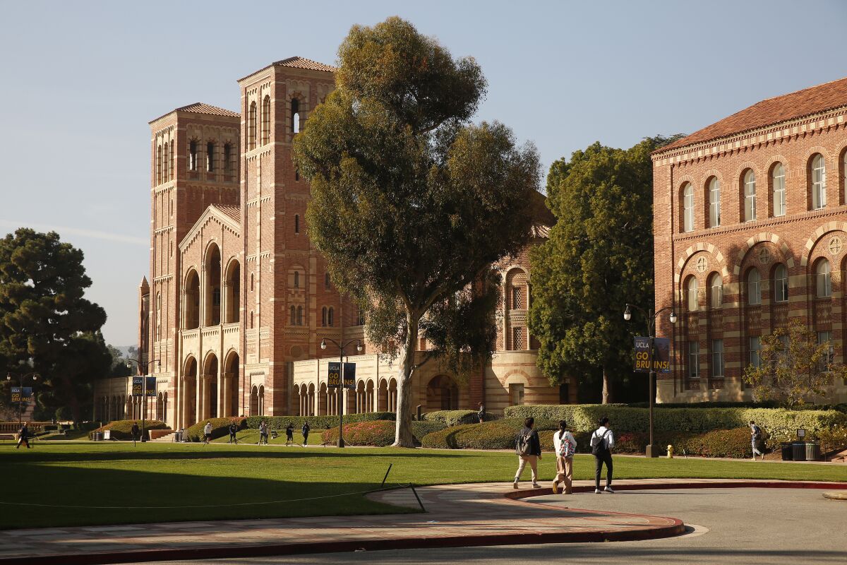 Students walk on the UCLA campus 