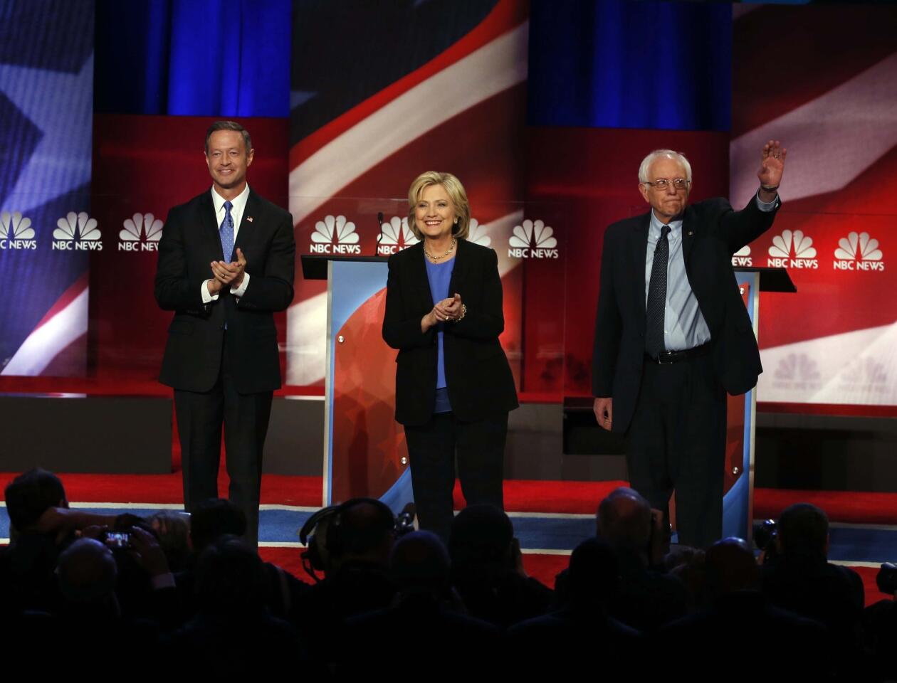 Democratic presidential candidates Martin O'Malley, left, Hillary Clinton and Bernie Sanders before their debate in South Carolina.