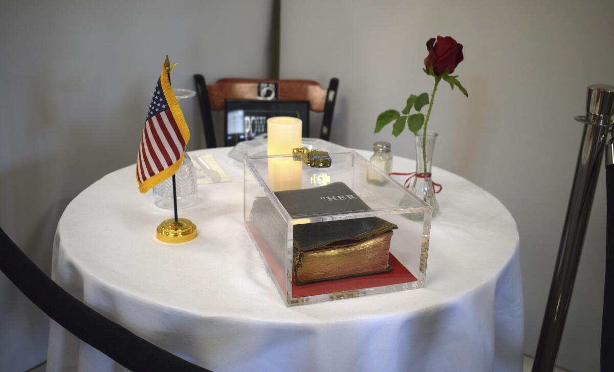 A Bible sits on a memorial table at the VA Medical Center in Manchester, N.H. Its presence has been challenged by a 1st Amendment lawsuit.

