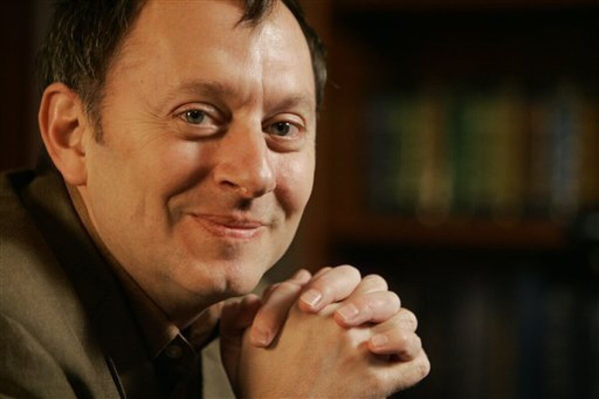FILE - In this Jan. 17, 2008 file photo, actor Michael Emerson, who plays Ben Linus in the ABC television series "Lost," poses for photos during an interview in New York. (AP Photo/Richard Drew, file)