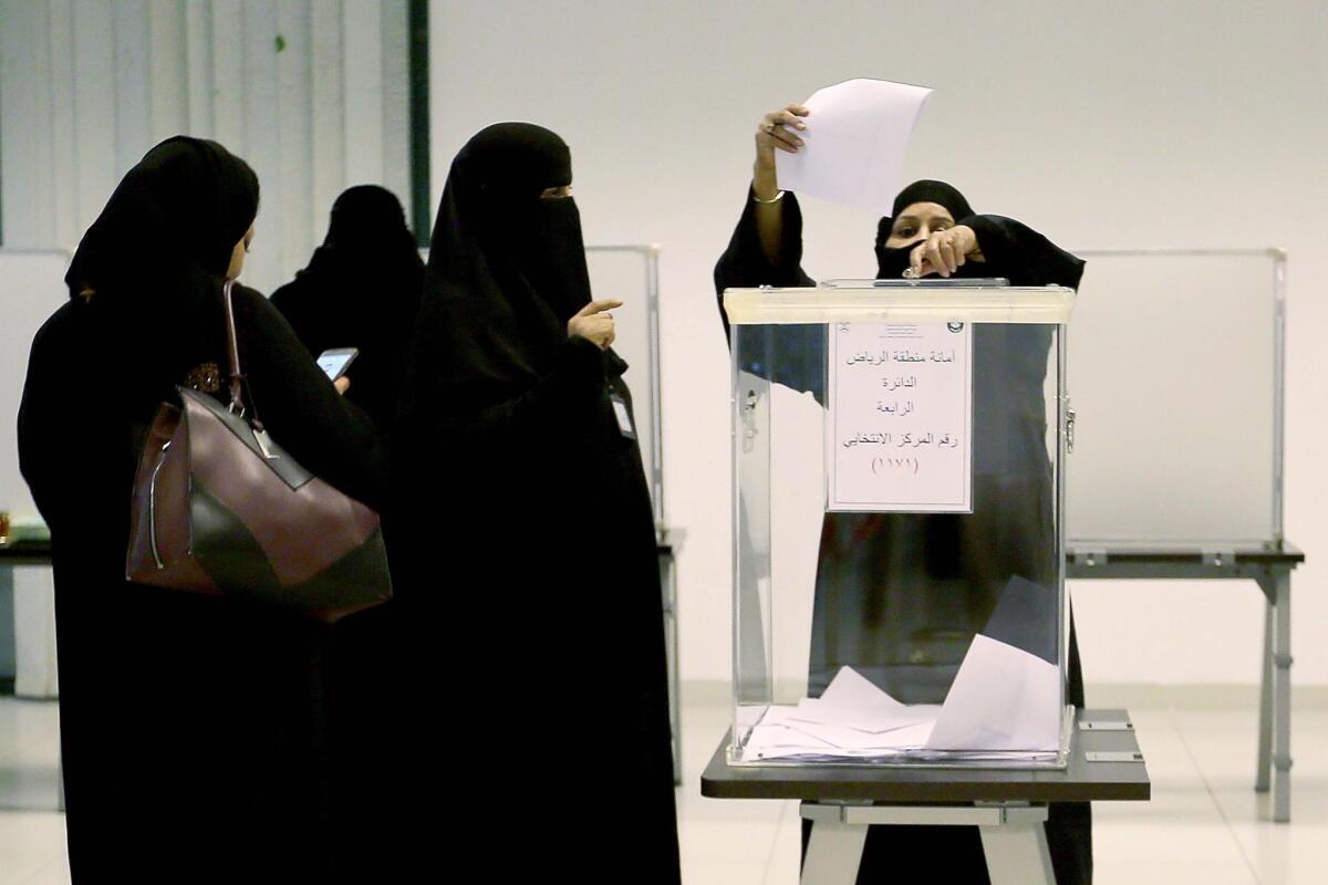 Saudi women cast their votes in the kingdom's municipal elections in Riyadh on Dec. 12.