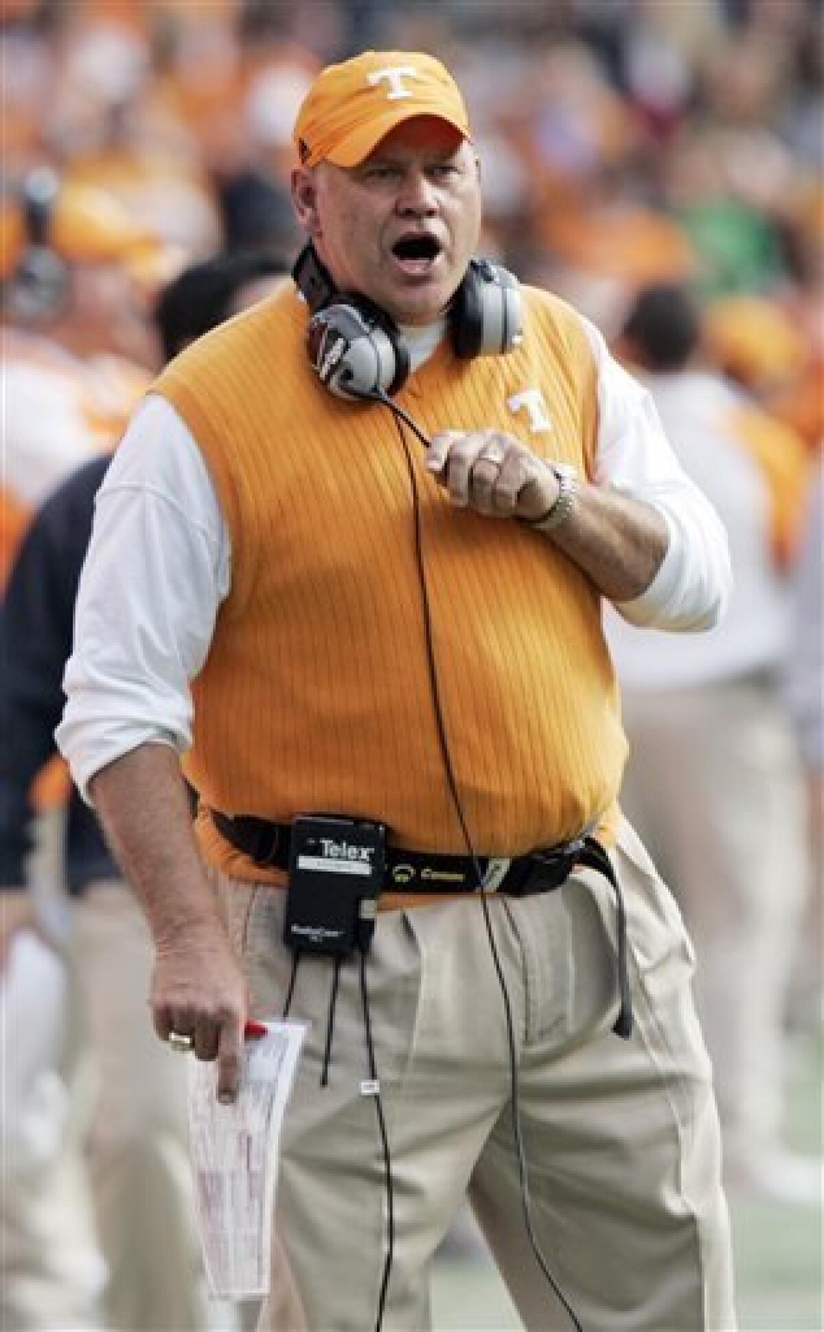 FILE - In this Nov. 8, 2008, file photo, Tennessee coach Phillip Fulmer yells to his team during the first half of an NCAA college football game against Wyoming in Knoxville, Tenn. The former Tennessee coach will serve as a consultant and special assistant to athletic director Richard Sander as East Tennessee State relaunches a football program it had shut down for financial reasons in 2003. (AP Photo/Wade Payne, File)
