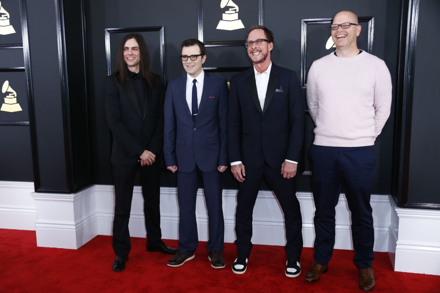 Weezer arrives at the 59th Grammy Awards.