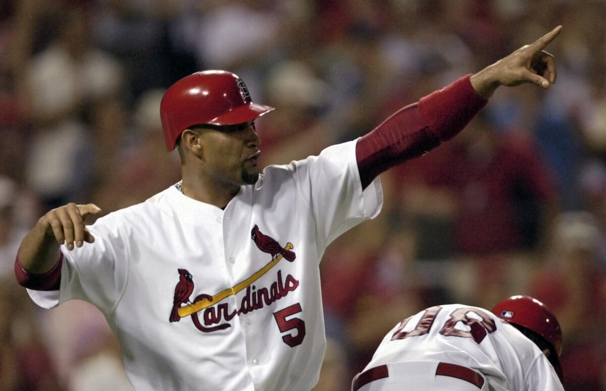 Albert Pujols celebrates during a game between the St. Louis Cardinals and San Diego Padres in July 2008.