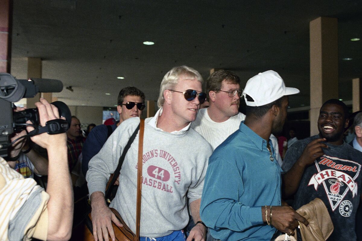 Bengals quarterback Boomer Esiason joins the team at its Miami hotel on Jan. 15, 1989, as it gets ready for Super Bowl XXIII.