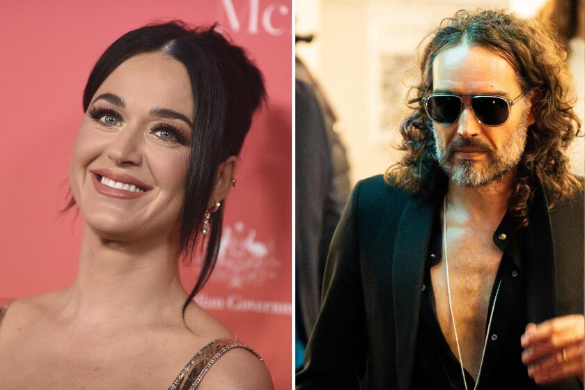 Katy Perry in a sleeveless dress with her dark hair in a bun. A photo of Russell Brand in dark sunglasses and facial hair