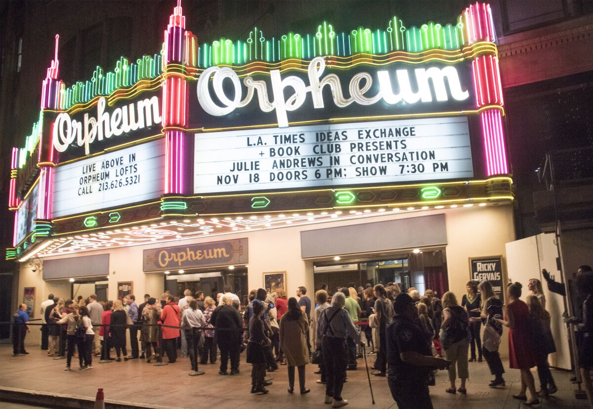 A crowd stands outside the Orpheum before going in to see Julie Andrews.