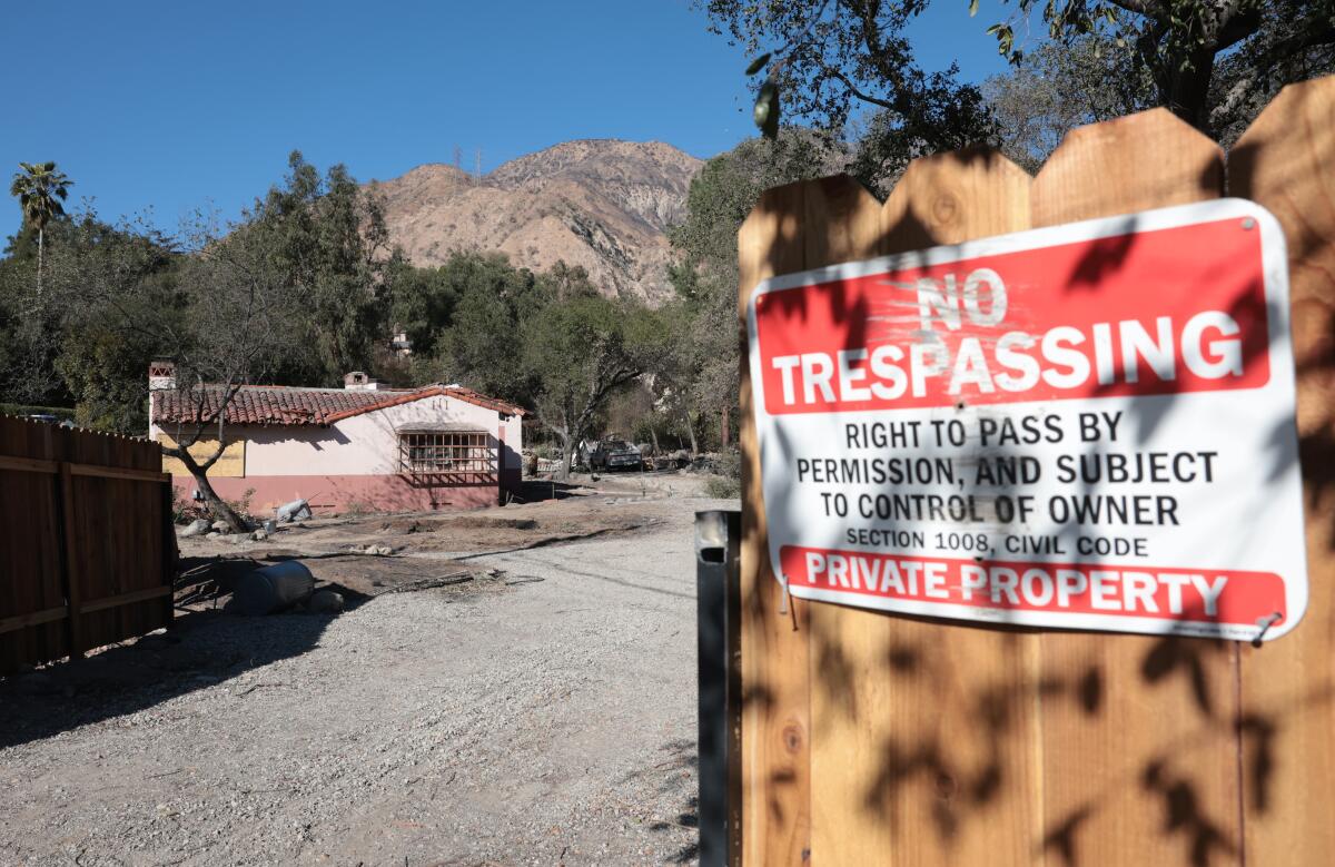 A "No Trespassing sign" is posted at an entry gate on the Tongva property.