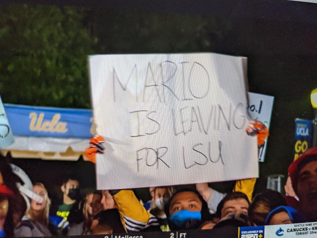 UCLA fans hold up signs during ESPN CollegeDay on Saturday.