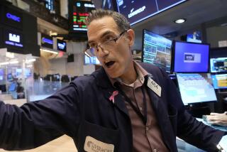 Trader Gregory Rowe works on the floor of the New York Stock Exchange, Friday, Aug. 16, 2024. (AP Photo/Richard Drew)