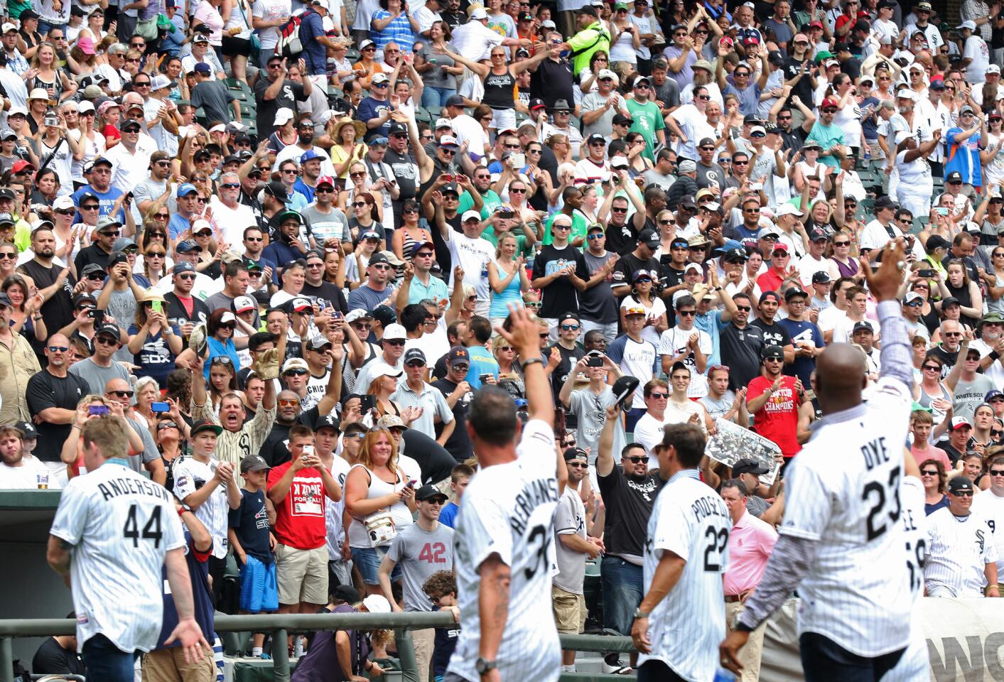 Former Chicago White Sox players wave to fans during a 2005 World Series Championship 10th anniversary ceremony on Saturday, July 18.
