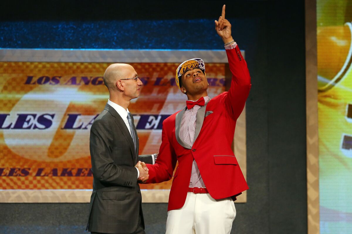 D'Angelo Russell gestures to the sky after being selected by the Lakers with the No. 2 overall pick in the 2015 NBA draft at Barclays Center in Brookyln, N.Y.