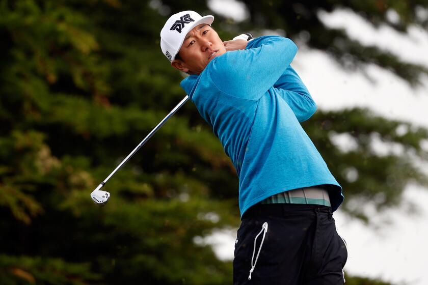 James Hahn plays his tee shot on the 11th hole during the AT&T Pebble Beach National Pro-Am.
