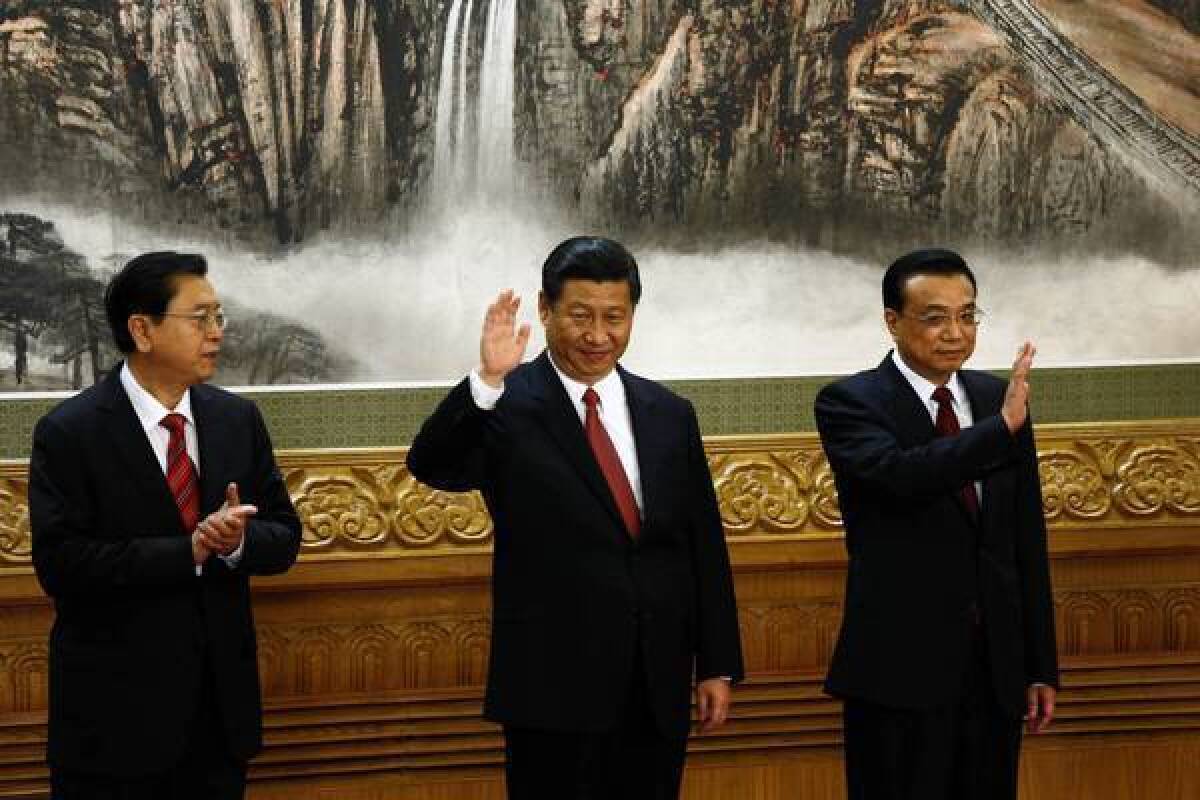 From left, three of the seven members of China's new Politburo Standing Committee: Zhang Dejiang, Xi Jinping and Li Keqiang. Xi was named party general secretary, meaning he will become China's president early next year.