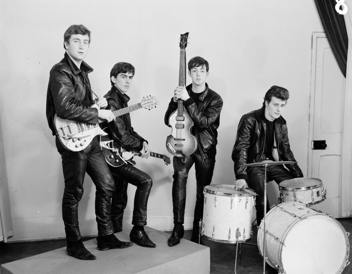 The Beatles in leather suits. An image from the book "Tune In: The Beatles: All These Years," by Mark Lewisohn.