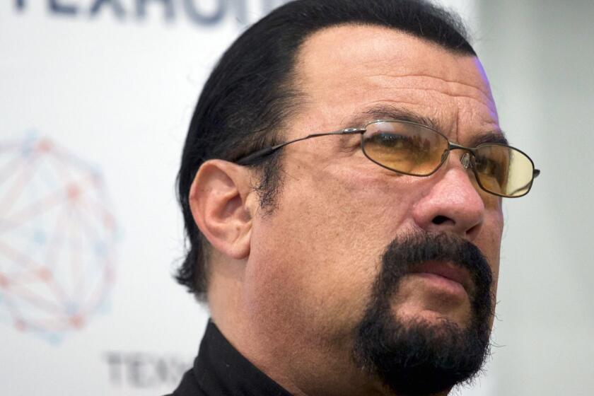 FILE - In this Sept. 22, 2015, file photo, actor Steven Seagal speaks at a news conference, while attending an opening ceremony for a research and development center in Moscow, Russia. Jenny McCarthy said on her Sirius XM show Nov. 9, 2017, that Seagal sexually harassed her during an audition in 1995. A Seagal spokesman has denied the McCarthyâs accusations to The Daily Beast. (AP Photo/Ivan Sekretarev, File)