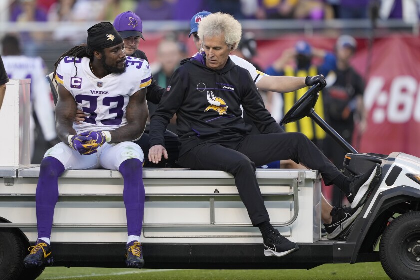 Minnesota Vikings running back Dalvin Cook (33) is carted off the field during the second half of an NFL football game against the San Francisco 49ers in Santa Clara, Calif., Sunday, Nov. 28, 2021. (AP Photo/Tony Avelar)