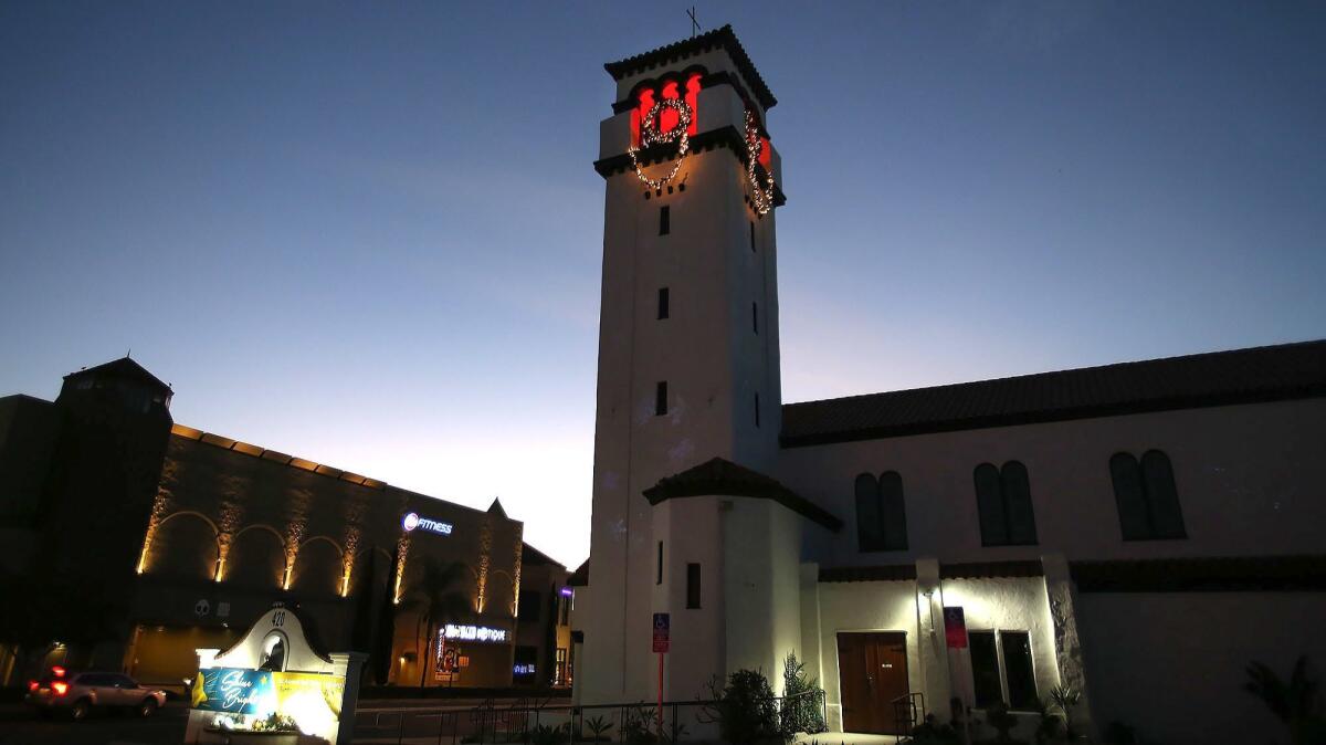 The landmark bell tower at First United Methodist Church at 420 W. 19th St. in Costa Mesa will be lighted every night through the end of the year.