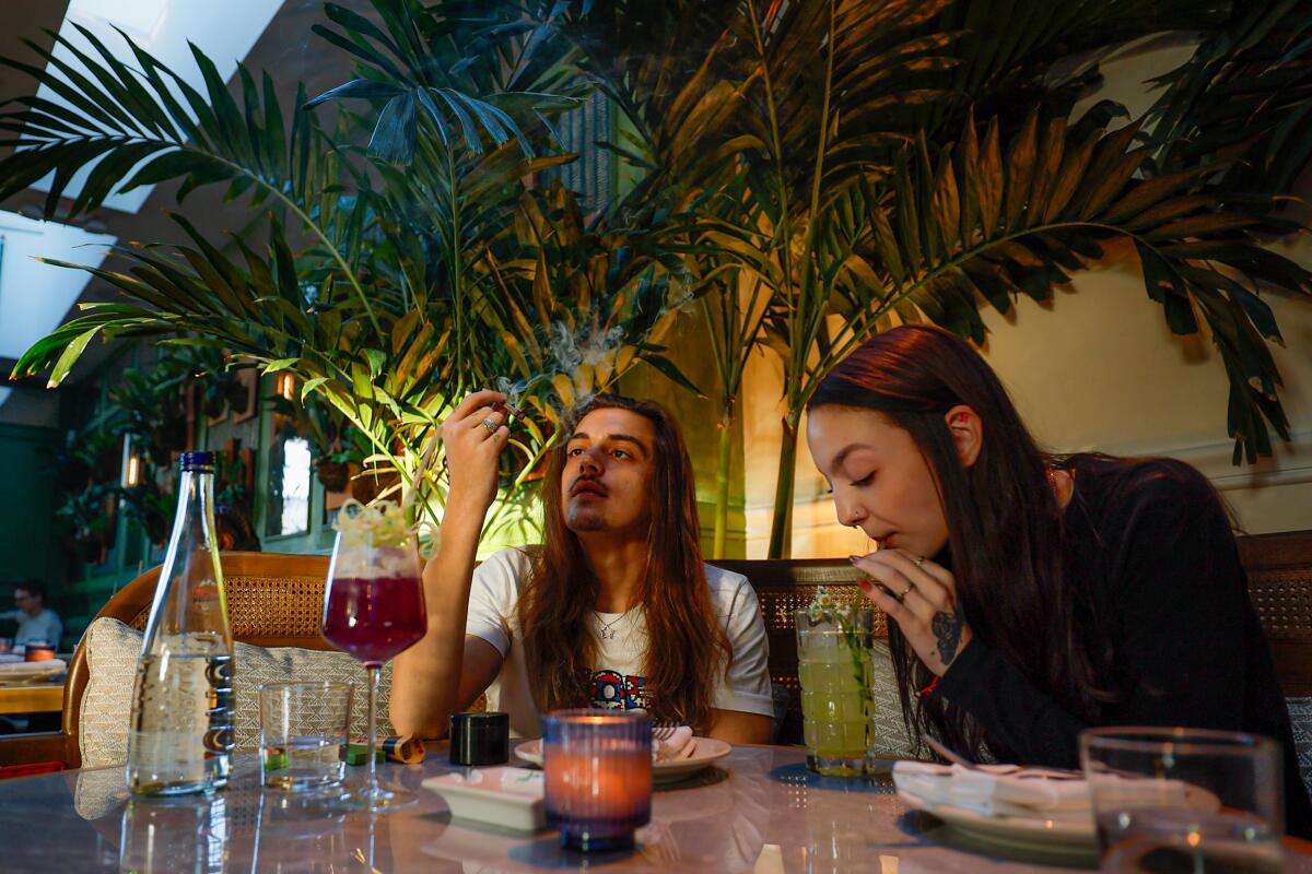 Two people at a cafe