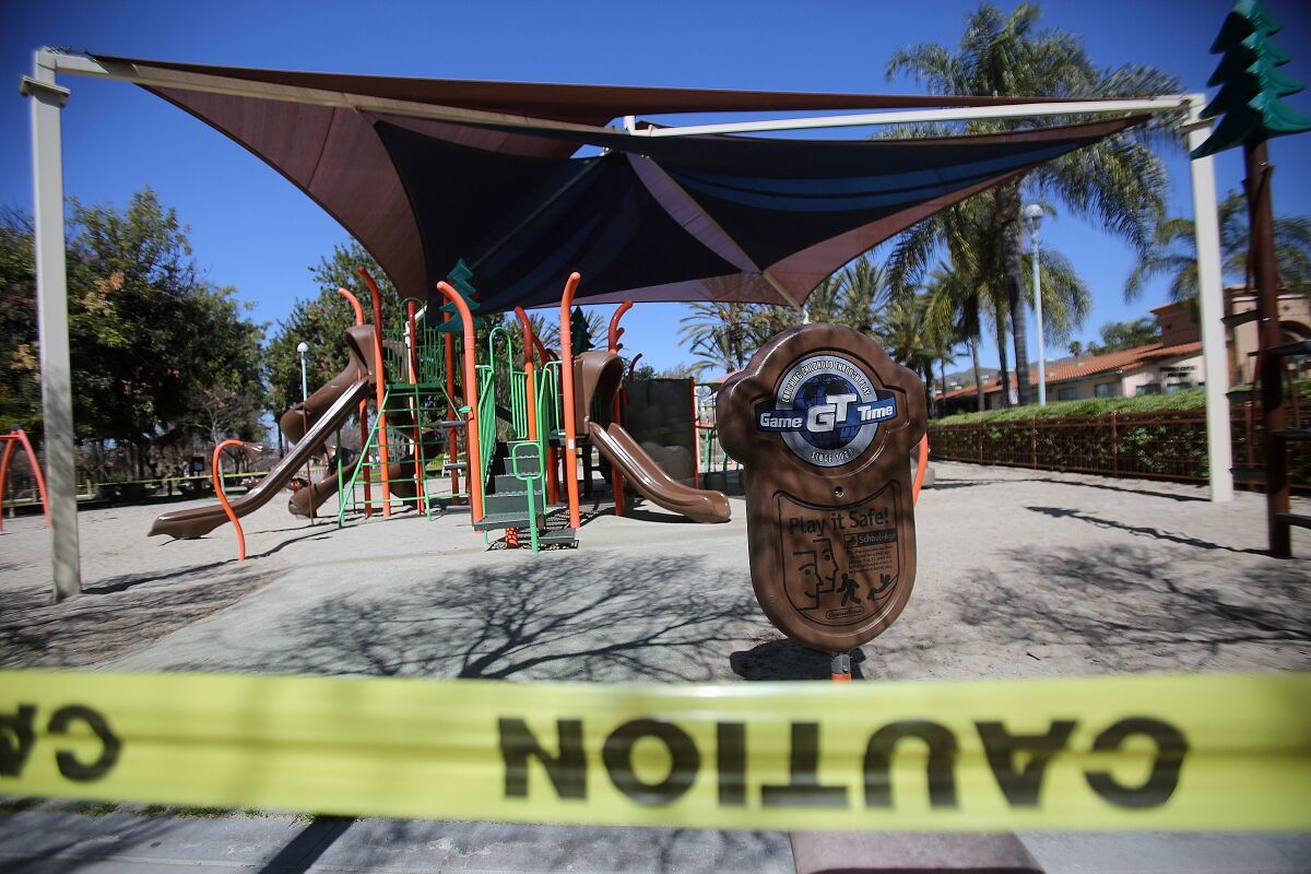 Parks all across Burbank will be closed during Easter weekend as a preventative measure against the novel coronavirus. Pictured is a playground at McCambridge Park on March 25 with caution taped wrapped around its perimeter. 