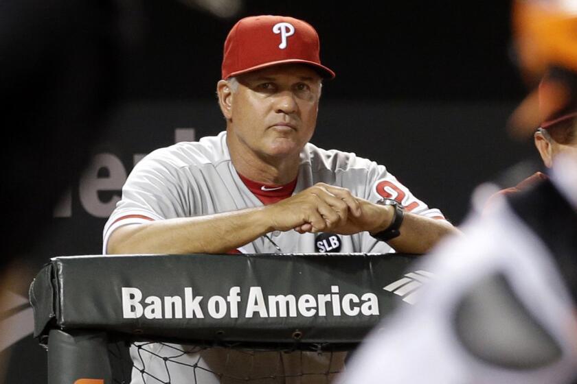 Ryne Sandberg posted a 119-159 mark over parts of three seasons as manager of the Philadelphia Phillies.