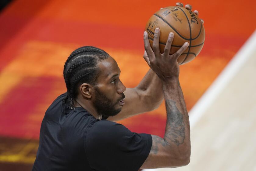 Los Angeles Clippers forward Kawhi Leonard warms up before Game 1 of the team's second-round NBA basketball playoff series against the Utah Jazz on Tuesday, June 8, 2021, in Salt Lake City. (AP Photo/Rick Bowmer)