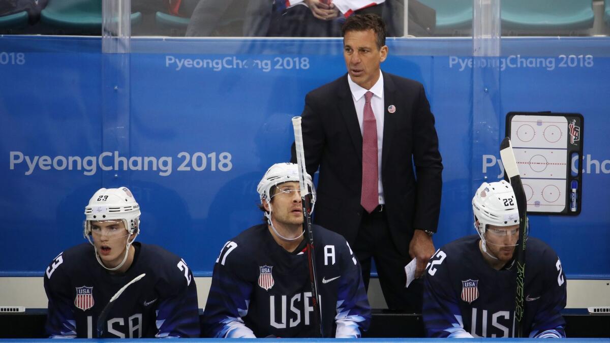 Former NHL star Chris Chelios, looking on during an Olympic hockey game, jumped at the opportunity to be an assistant on the U.S. team.