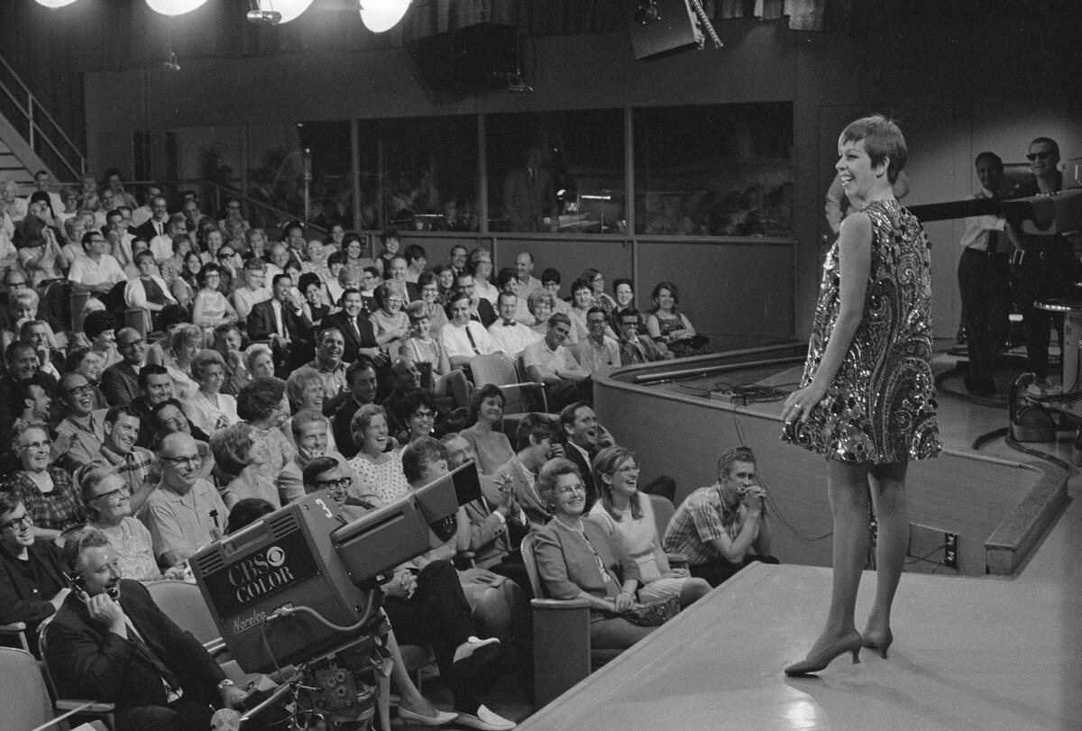 Carol Burnett on stage in front of the audience for "The Carol Burnett Show."