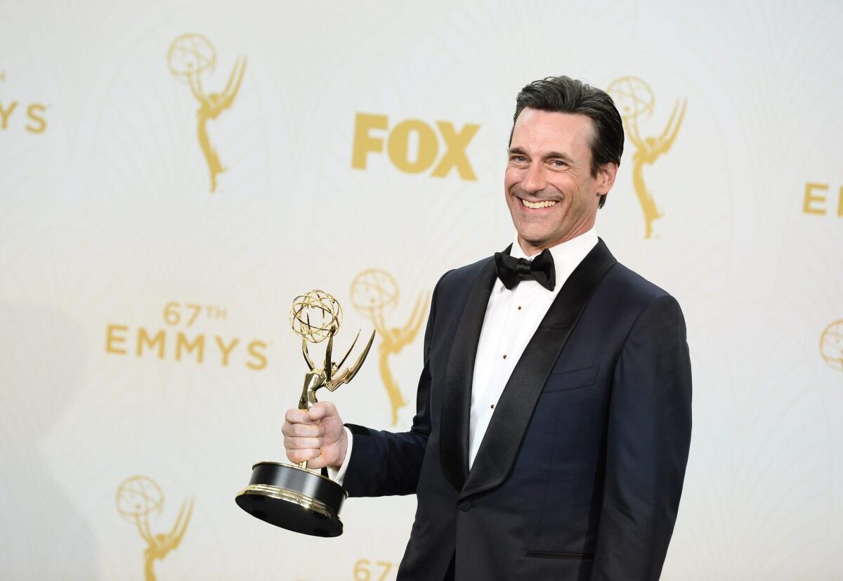 epa04942034 Jon Hamm, winner of the Outstanding Lead Actor in a Drama Series award for 'Mad Men', poses in the press room during the 67th annual Primetime Emmy Awards held at the Microsoft Theater in Los Angeles, California, USA, 20 September 2015. The Primetime Emmy Awards celebrate excellence in national primetime television programming. EPA/PAUL BUCK ** Usable by LA, CT and MoD ONLY **