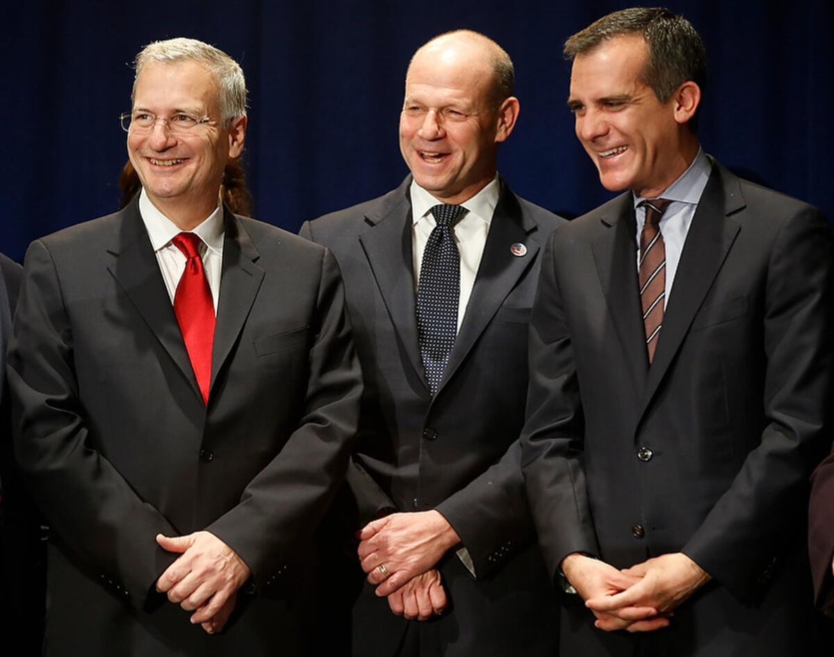 Attending the 7th annual National Immigrant Integration Conference at Los Angeles Convention Center on Monday are, from left, Citigroup executive Bob Annibale, U.S. Citizenship and Immigration Services director Leon Rodriguez and Los Angeles Mayor Eric Garcetti.