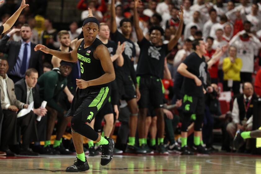 COLLEGE PARK, MARYLAND - FEBRUARY 29: Cassius Winston #5 of the Michigan State Spartans celebrates his three pointer against the Maryland Terrapins during the second half at Xfinity Center on February 29, 2020 in College Park, Maryland. (Photo by Patrick Smith/Getty Images)